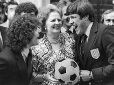 Margaret Thatcher enjoys a joke with Kevin Keegan and Emlyn Hughes, 6th June 1980