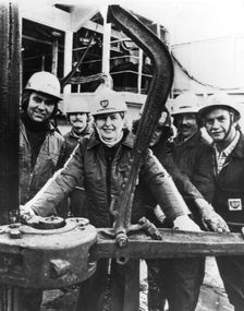 Margaret Thatcher with technicians aboard the North Sea oil rig Sea Quest 10th September 1975. Creator: Unknown