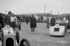 Marendaz Special of AC Hess and Bugatti Type 35 of O Bertram at a BARC meeting, Brooklands, 1930. Artist: Bill Brunell