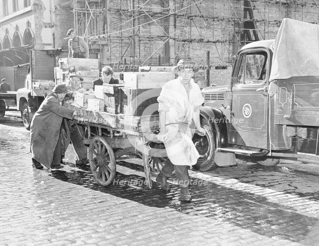 Market porter at Billingsgate, London, (c1930s?). Creator: Unknown.