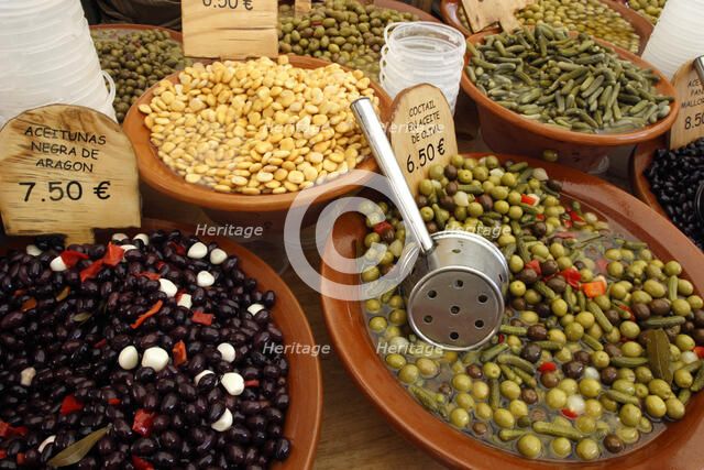 Market stall, Mallorca, Spain. Olives, beans and gherkins.