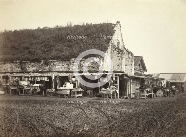 Market stalls beside old powder magazine, Irkutsk, between 1885 and 1886. Creator: Unknown.