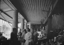 Market scene, New Orleans, between 1920 and 1926. Creator: Arnold Genthe