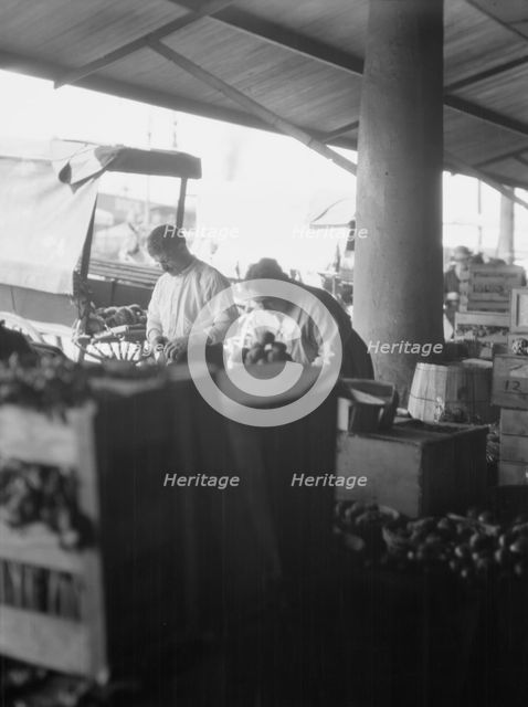 Market scene, New Orleans, between 1920 and 1926. Creator: Arnold Genthe.