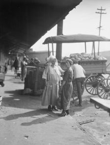 Market scene, New Orleans, between 1920 and 1926. Creator: Arnold Genthe