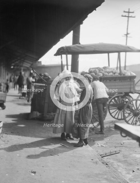 Market scene, New Orleans, between 1920 and 1926. Creator: Arnold Genthe.