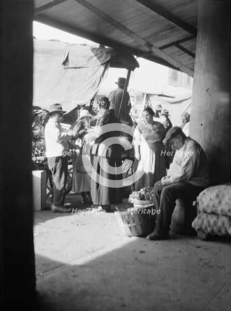 Market scene, New Orleans, between 1920 and 1926. Creator: Arnold Genthe.
