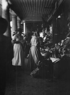 Market scene, New Orleans, between 1920 and 1926. Creator: Arnold Genthe