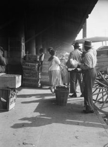 Market scene, New Orleans, between 1920 and 1926. Creator: Arnold Genthe