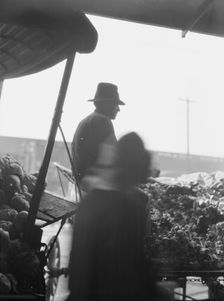 Market scene, New Orleans, between 1920 and 1926. Creator: Arnold Genthe