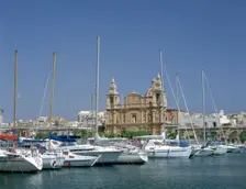 Marina and church, Malta. Creator: Peter Thompson