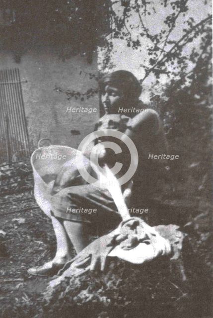 Marina Tsvetaeva with her dog. Savoy, 1930.