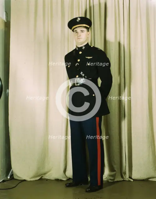 Marine Corps Captain in dress blue uniform, World War II, between 1941 and 1945. Creator: Howard Hollem.