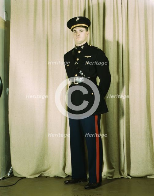 Marine Corps Captain in dress blue uniform, World War II, between 1941 and 1945. Creator: Howard Hollem.