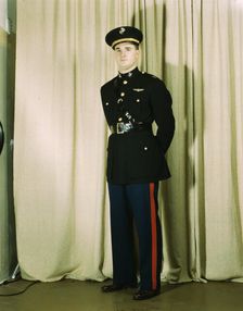 Marine Corps Captain in dress blue uniform, World War II, between 1941 and 1945. Creator: Howard Hollem