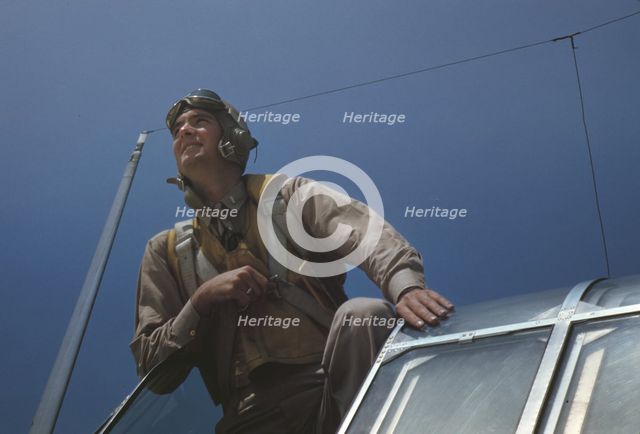 Marine Corps lieutenant studying glider piloting at Page Field, Parris Island, S.C., 1942. Creator: Alfred T Palmer.
