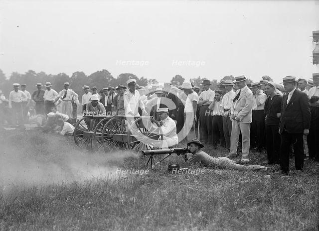 Marine Corps Rifle Range, Winthrop, Md. - Gen. Barnett Testing Colt's Automatic Machine Gun, 1917. Creator: Harris & Ewing.