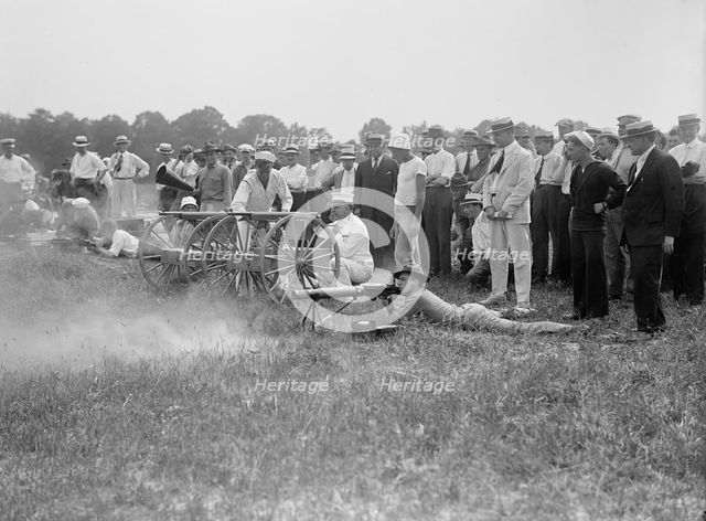 Marine Corps Rifle Range, Winthrop, Md. - Gen. Barnett Testing Colt's Automatic Machine Gun, 1917. Creator: Harris & Ewing.