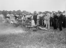 Marine Corps Rifle Range, Winthrop, Md. - Gen. Barnett Testing Colt's Automatic Machine Gun, 1917. Creator: Harris & Ewing