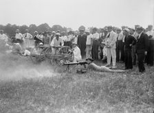 Marine Corps Rifle Range, Winthrop, Md. - Gen. Barnett Testing Colt's Automatic Machine Gun, 1917. Creator: Harris & Ewing