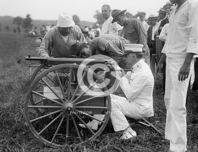 Marine Corps Rifle Range, Winthrop, Md. - Gen. Barnett Testing Colt's Automatic Machine Gun, 1917. Creator: Harris & Ewing.