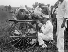 Marine Corps Rifle Range, Winthrop, Md. - Gen. Barnett Testing Colt's Automatic Machine Gun, 1917. Creator: Harris & Ewing