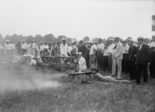 Marine Corps Rifle Range, Winthrop, Md. - Gen. Barnett Testing Colt's Automatic Machine Gun, 1917. Creator: Harris & Ewing