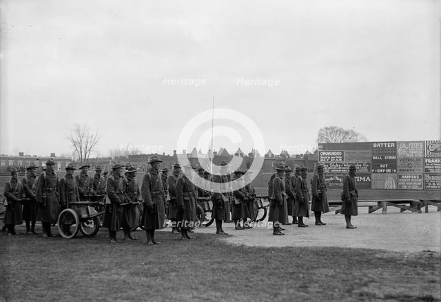 Marine Corps, U.S.N. Machine Gun Unit Demonstration at Ball Park, 1917. Creator: Harris & Ewing.