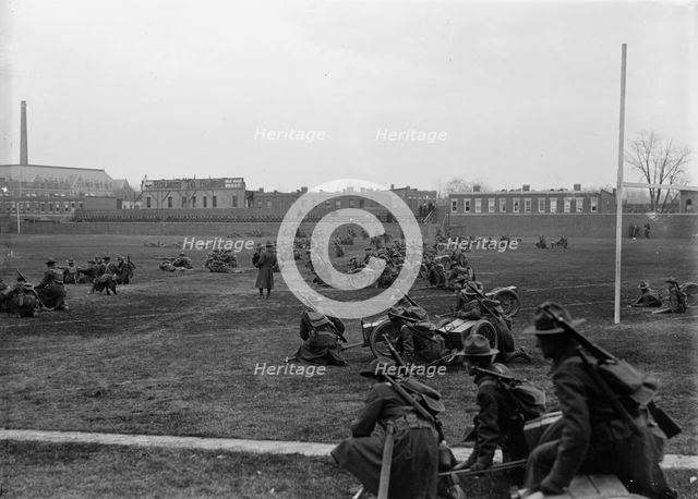 Marine Corps, U.S.N. Machine Gun Unit Demonstration at Ball Park, 1917. Creator: Harris & Ewing.