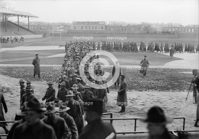 Marine Corps, U.S.N. Machine Gun Unit Demonstration at Ball Park, 1917. Creator: Harris & Ewing.