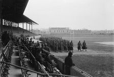 Marine Corps, U.S.N. Machine Gun Unit Demonstration at Ball Park, 1917. Creator: Harris & Ewing