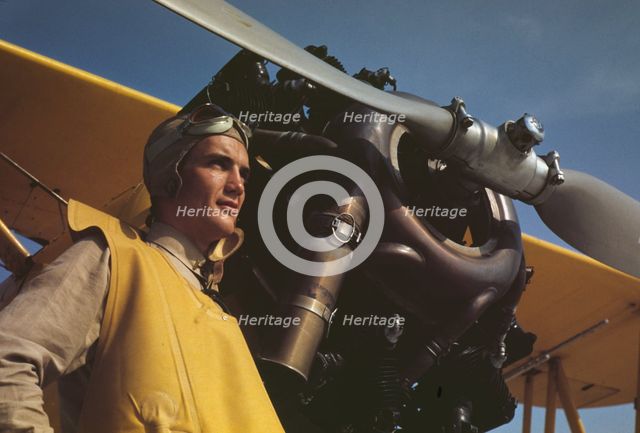 Marine lieutenant by the power plane which tows...at Page Field, Parris, Island, S.C., 1942. Creator: Alfred T Palmer.