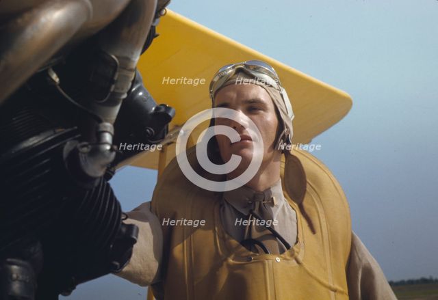 Marine lieutenant by the power towing plane for the gliders at Page Field, Parris Island, S.C., 1942 Creator: Alfred T Palmer.
