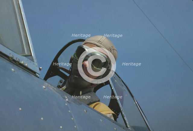 Marine lieutenant, glider pilot in training, ready for..., at Page Field, Parris Island, S.C., 1942. Creator: Alfred T Palmer.