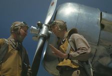 Marine lieutenants, pilots, by the power tow-plane for the...Page Field, Parris Island, S.C., 1942. Creator: Alfred T Palmer