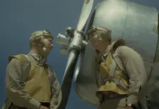 Marine lieutenants, pilots, by the power tow-plane...Parris Island's Page Field, S.C., 1942. Creator: Alfred T Palmer