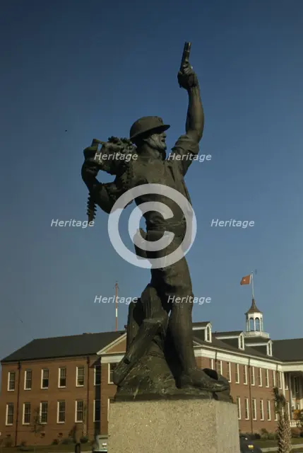 Marine statue at Parris Island, S.C. Statue called "Iron Mike" by recruits. , 1942. Creator: Alfred T Palmer.