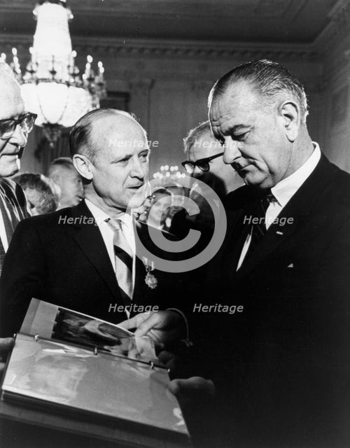 Mariner photos presented to President Johnson, 1965. Creator: NASA.
