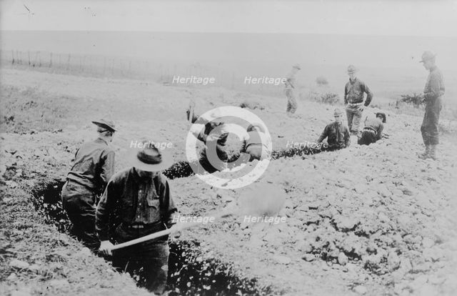 Marines dig a trench (France), 23 Jan 1918. Creator: Bain News Service.