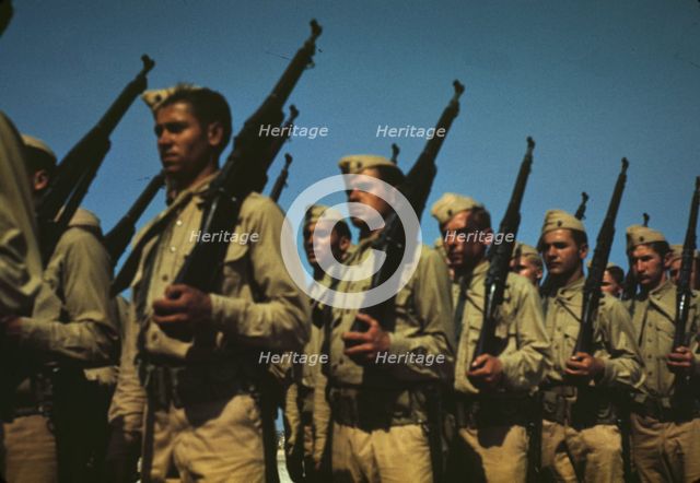 Marines finishing training at Parris Island, S.C., 1942. Creator: Alfred T Palmer.