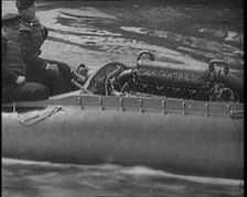 Marion Barbara Joe Carstairs on a Speedboat with a Male Civilian Passenger, 1920. Creator: British Pathe Ltd
