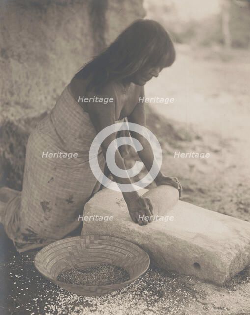 Maricopa Woman Mealing, 1907 Creator: Edward Sheriff Curtis.