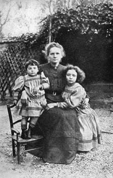 Marie Curie, Polish-born French physicist, with her daughters Eve and Irene, 1908. Creator: Unknown