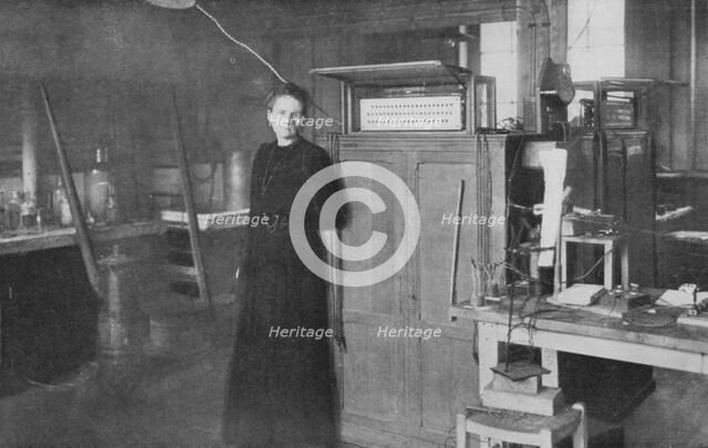 Marie Curie, Polish-born French physicist, in her laboratory, 1912. Artist: Unknown