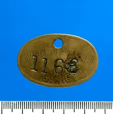 Maritime Colliery, lamp check (brass), c1890-1910. Creator: Unknown