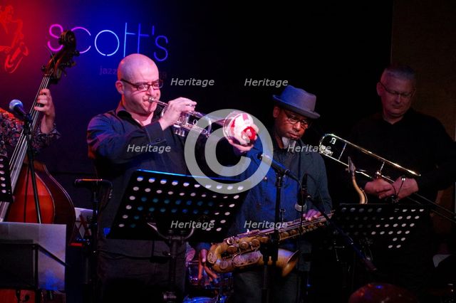 Mark White and Denys Baptiste, Ronnie Scott's, Soho, London, 5th June 2016. Artist: Brian O'Connor.