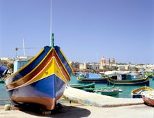 Marsaxlokk harbour, Malta. Creator: Peter Thompson