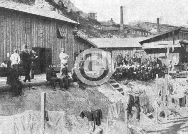 'Marseille en Fete; Prisonniers allemands au repos devant leurs baraquements a l'Estaque', 1916. Creator: Unknown.