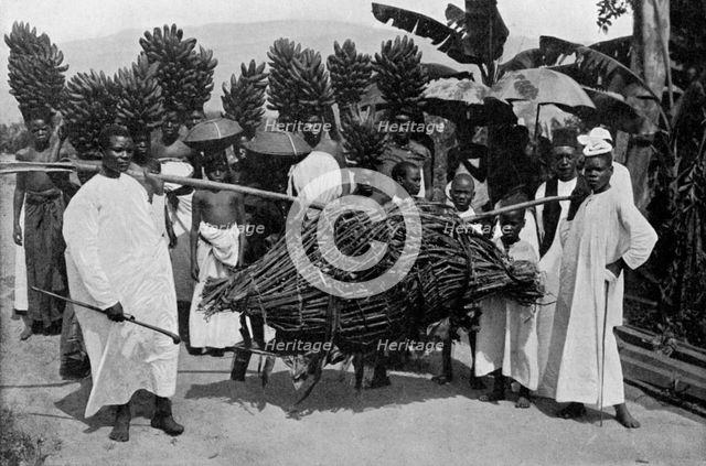 Marriage custom, Uganda, 1920.Artist: CW Hattersley