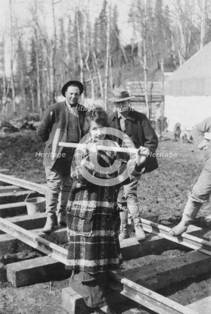 Martha White driving first spike in the government railway, between c1900 and c1930. Creator: Unknown.